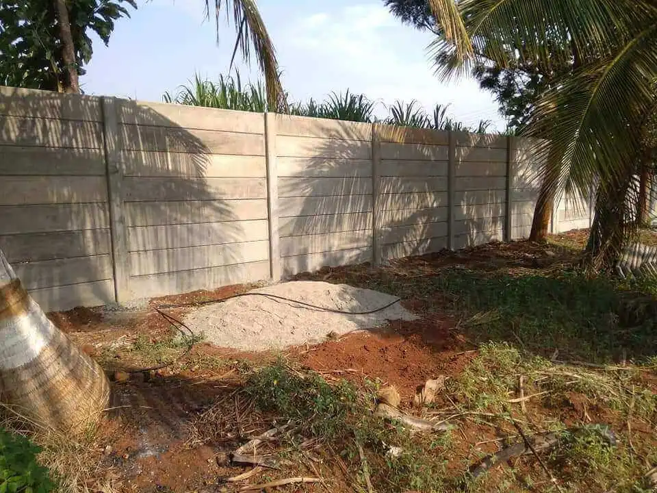 Precast boundary wall around a farmhouse plot