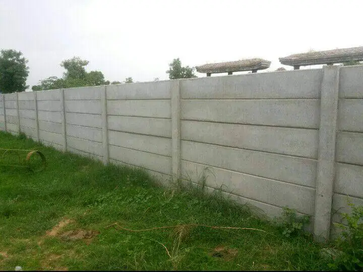 Precast compound wall along an open field